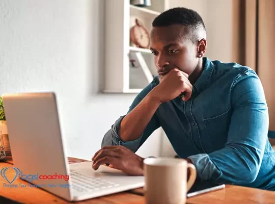 Man thinking, typing and working on a laptop remote for a social media startup content writing business. Planning, focused and serious freelancer, writer or author reading and reviewing an article