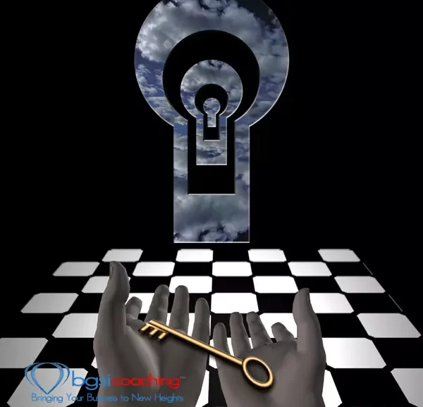 BGSICoaching | Key in human hands. Mystic keyholes and checkered floor | Unlock Your Imagination